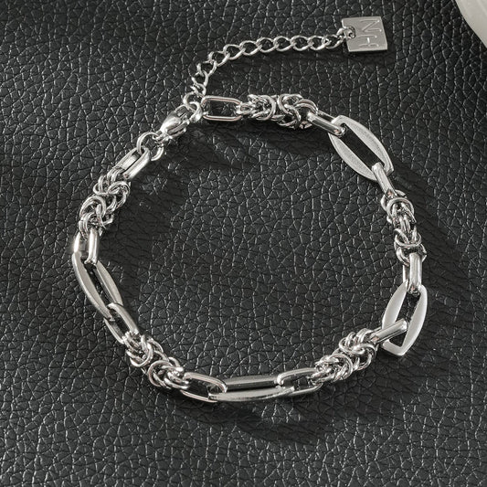 HACKNEY NINE Silver SORRENTO white gold mixed link chain bracelet with intricate links and polished finish.