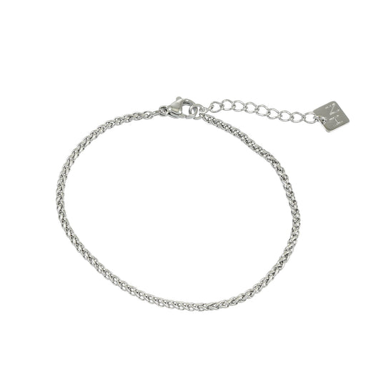 HACKNEY NINE Silver woven chain bracelet with contemporary braided link design, dainty and intricate white gold jewelry.