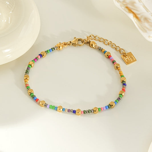 AYDA Gold Confetti Luxe Beaded Bracelet by HACKNEY NINE Jewelry with colorful beads and intricate beaded design.