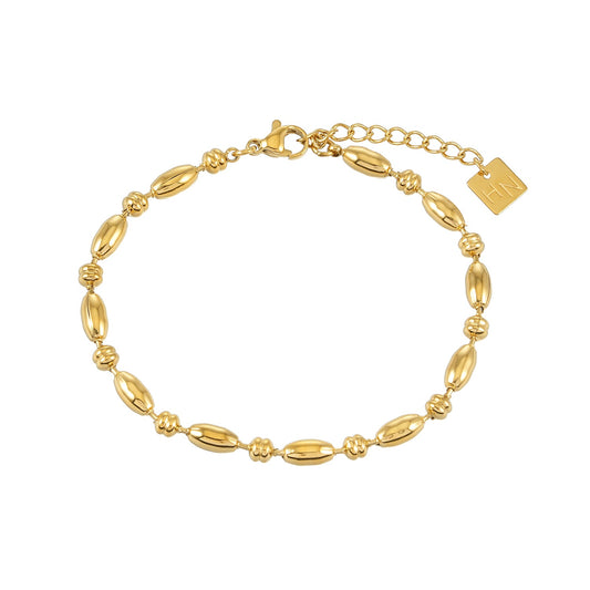 HACKNEY NINE Jewellery ADIATA Gold polished oval bead bracelet with sculpted design, elegant statement jewelry for women.