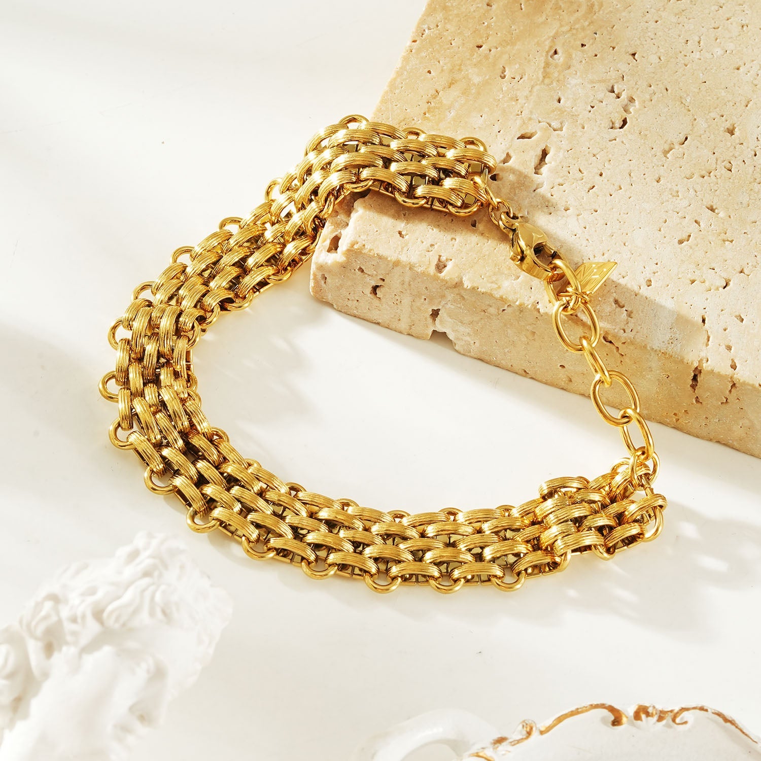 HACKNEY NINE Jewellery Carpi Gold vintage woven textured statement bracelet showing intricate gold-tone design.