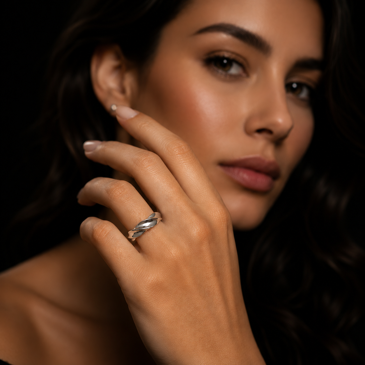 Modernist silver ring with white gold accents, featuring geometric shapes and textured details from Hackney Nine Jewellery.