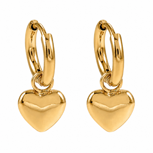 Gold mini hoop earrings by Hackney Nine Jewelry featuring a heart-shaped charm for a delicate, stylish look.